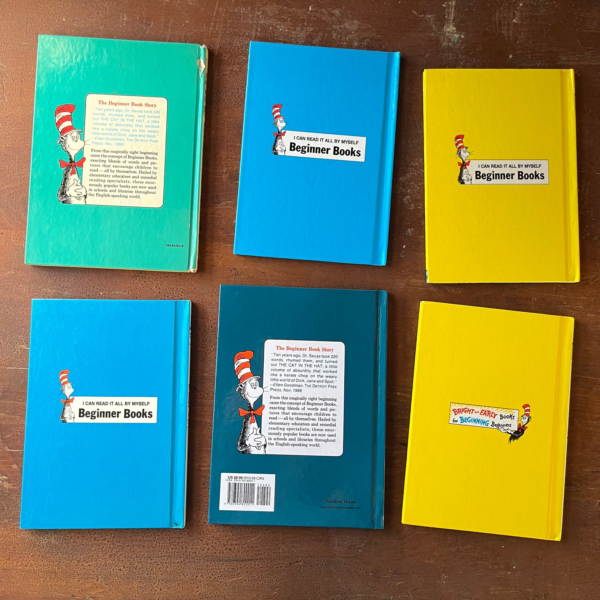 Dr. Seuss & Theo. LeSieg Book Set  Bright & Early Books for Beginning Beginners-vintage children's picture books-view of the glossy back covers with the Beginner Book Emblem in the middle