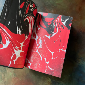 Edgar Allan Poe Classic Stories-Barnes & Noble Collectible Editions Series-Leatherbound-short stories-macabre-view of the marbeled inside cover in black, white & red