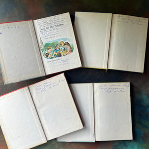 Faith & Freedom Basic Readers Book Set by Ginn and Company-vintage school books-reading comprehension-Parochial Schoolbooks-Catholic School-view of the inside covers - note the writing in all four books