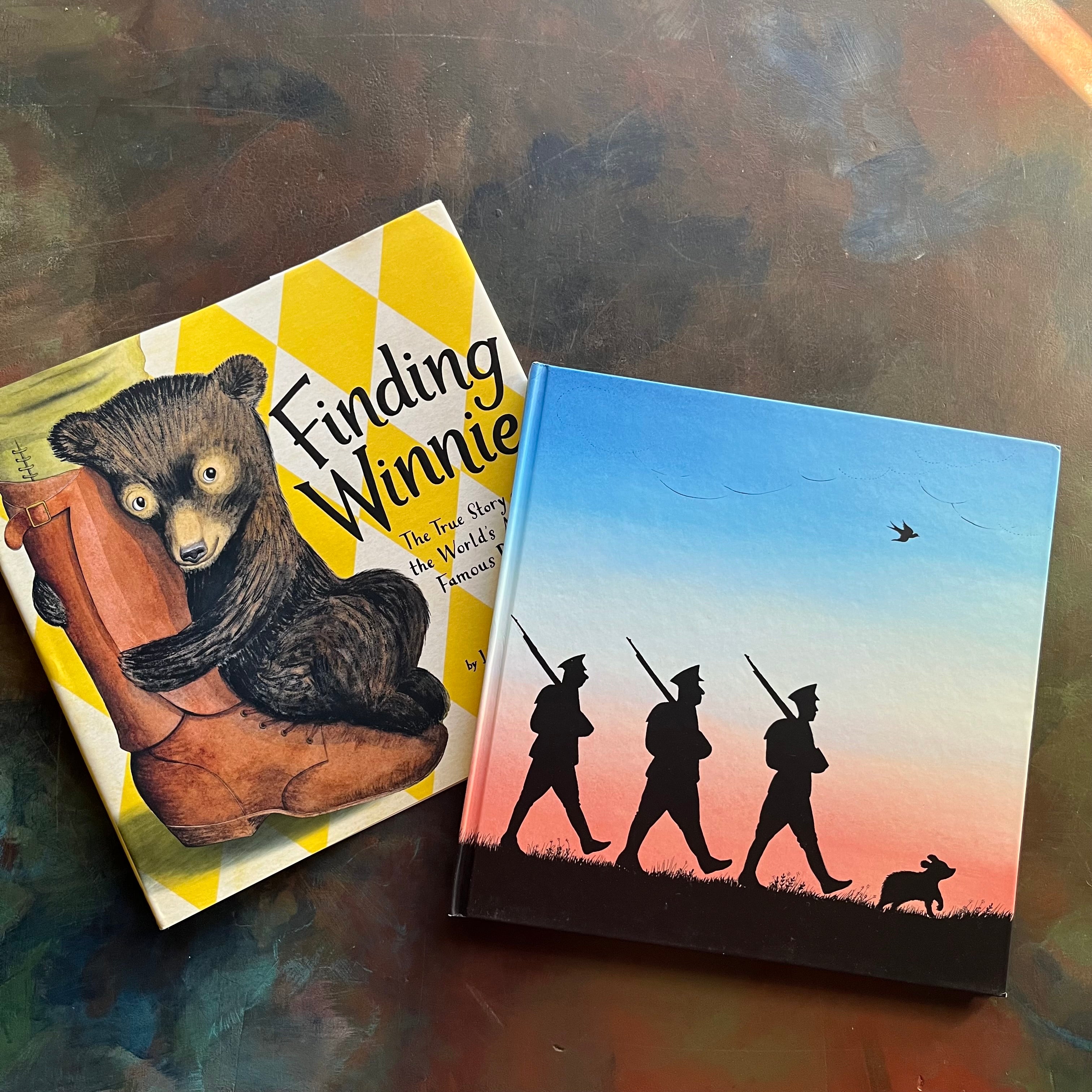 Finding Winnie The True Story of the World's Most Famous Bear written by Lindsay Mattick with illustrations by award winning artist Sophie Blackall-2016 Caldecott Winner-read aloud revival-children's story-Winnie the Pooh-view of the front cover with solider marching behind a running bear