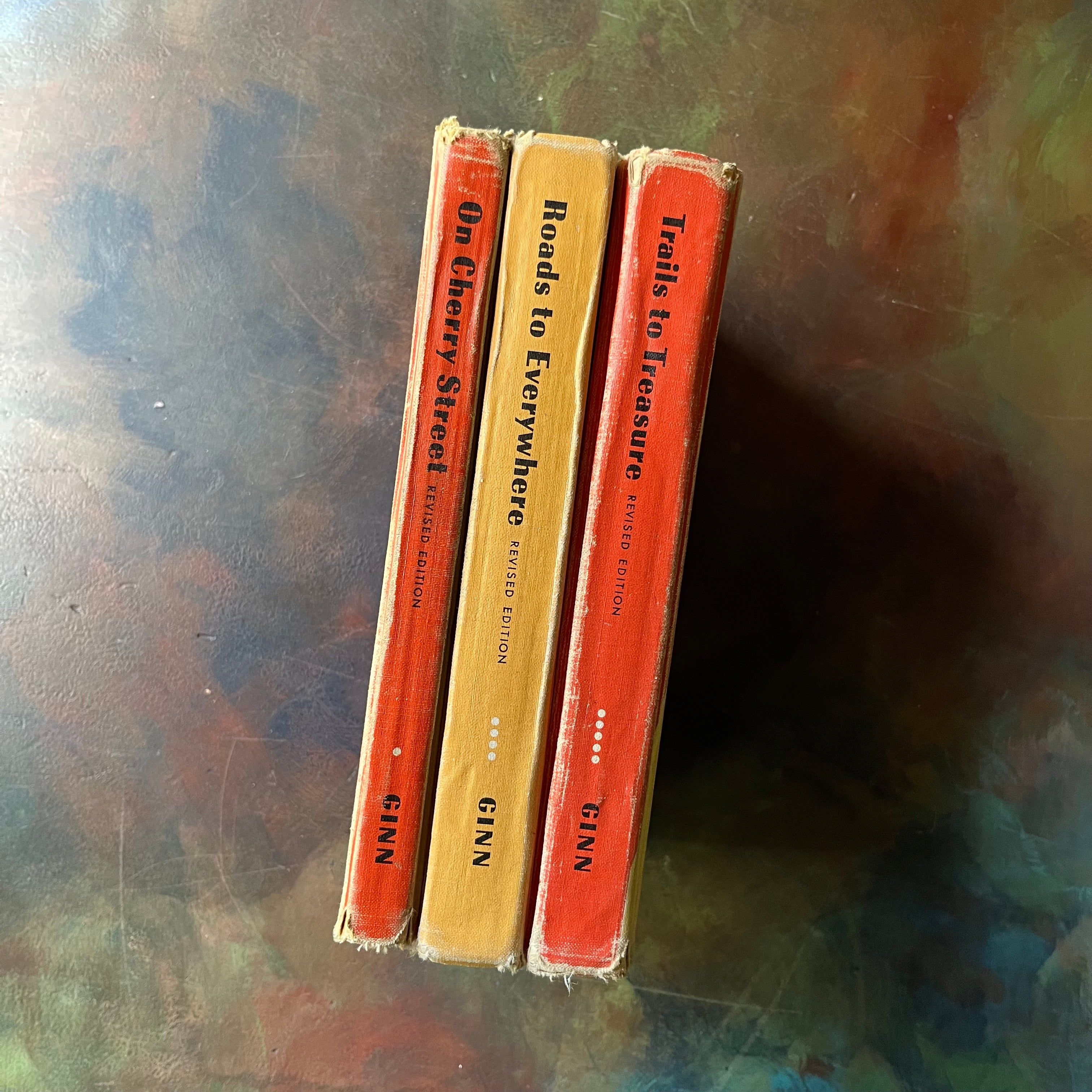 Ginn Basic Readers Vintage School Book Set-On Cherry Street-Roads Everywhere-Trails to Treasure-vintage reading comprehension books-vintage schoolbooks-view of the spines