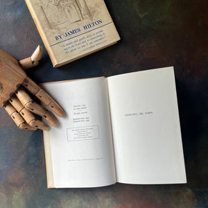 Good-Bye, Mr. Chips by James Hilton-British Novella-First Edition-antique book-view of the copyright & dedication pages open on a tabletop 