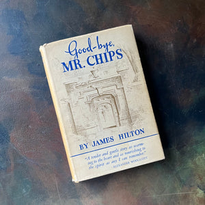Book titled 'Good-bye, Mr. Chips' by James Hilton on a textured surface-antique, first edition-view of the dust jacket's cover