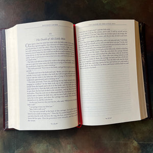Grimm's Complete Fairy Tales by The Brother's Grimm-Canterbury Classics Leatherbound Edition-classic Fairy Tales for all ages-view of the satin page marker still tucked between two pages having never been moved