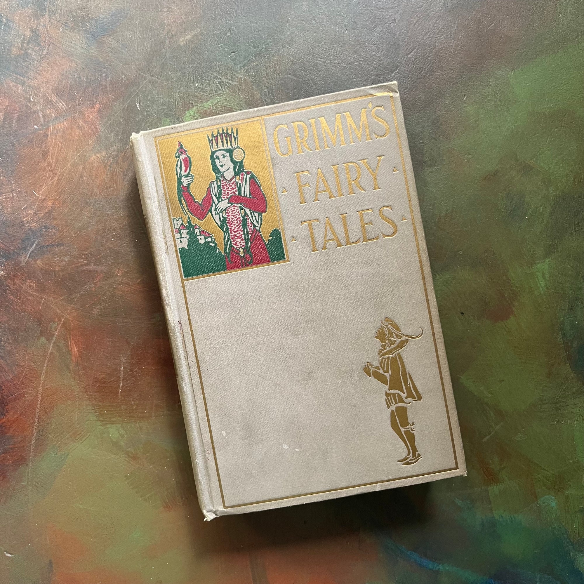 Grimm's Fairy Tales-The Brother's Grimm-Hurst & Co.-1910-1919-antique fairy tales for children-vintage children's book-view of the embossed front cover with the title in gilt as well as two book specific illustrations shown