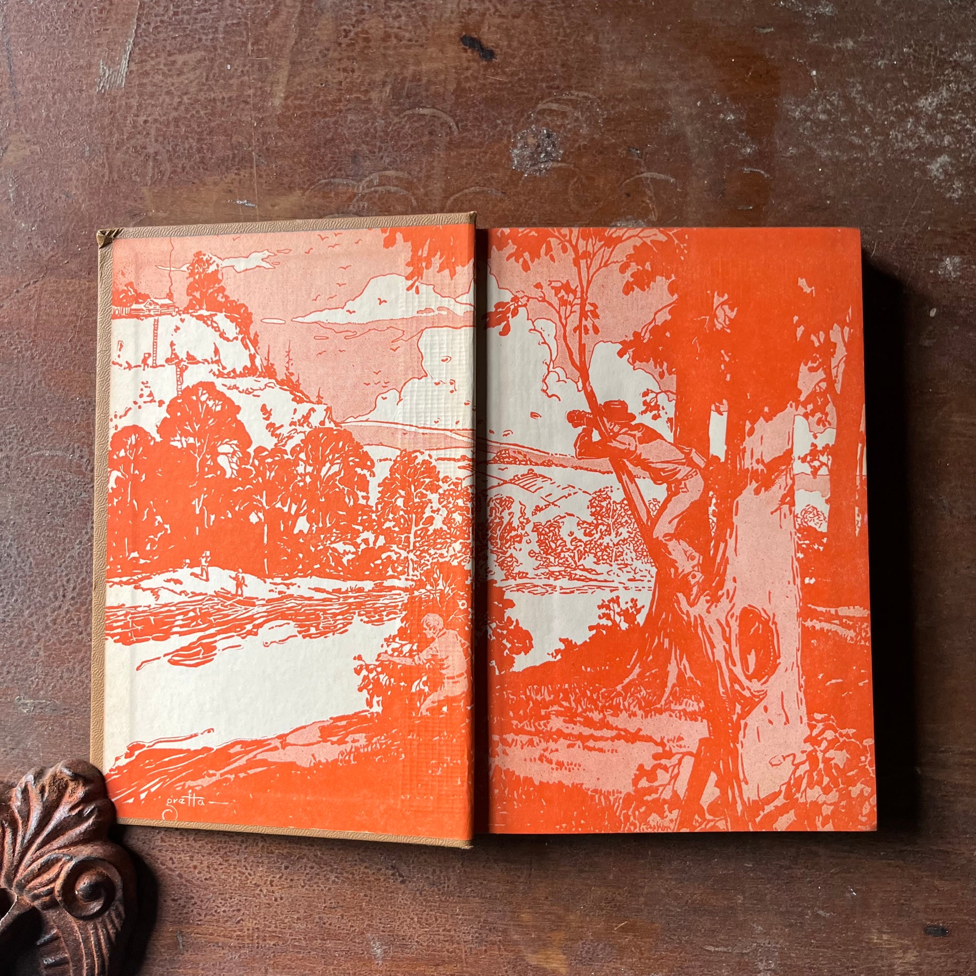 vintage children's chapter book, vintage adventure book for boys, homeschool library, The Hardy Boys Mystery Book - #7  The Hardy Boys and the Secret of the Caves written by Franklin W. Dixon - view of the inside cover in bright orange