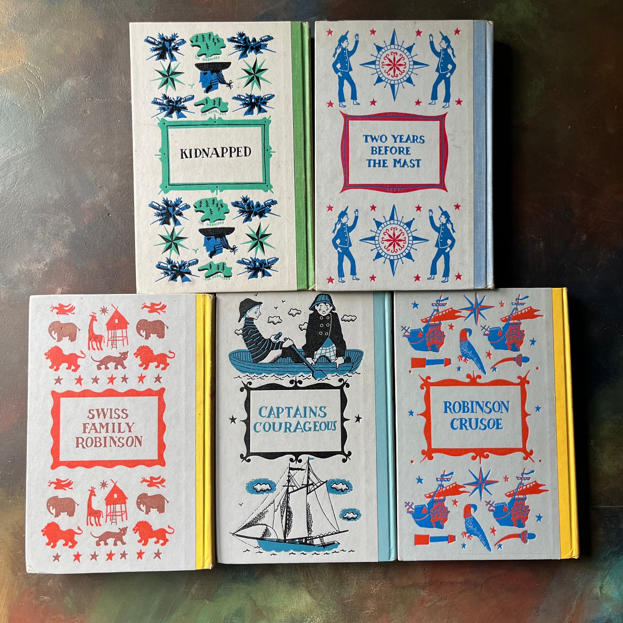 High Seas & Faraway Lands–Classic Adventure Books-Junior Deluxe Editions 5 Book Set-vintage children's chapter books-view of the embossed back covers