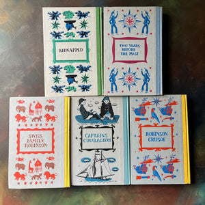 High Seas & Faraway Lands–Classic Adventure Books-Junior Deluxe Editions 5 Book Set-vintage children's chapter books-view of the embossed back covers