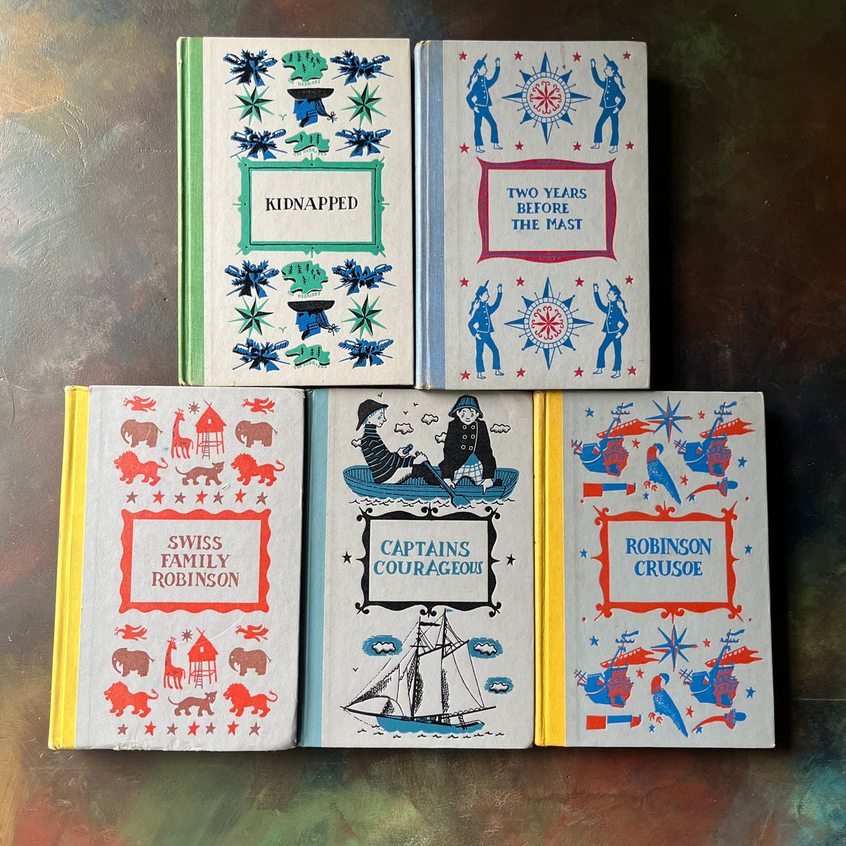 High Seas & Faraway Lands–Classic Adventure Books-Junior Deluxe Editions 5 Book Set-vintage children's chapter books-view of the embossed front covers