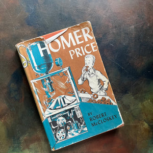 Homer Price-Robert McCloskey-vintage children's chapter book-humorous family read-aloud-vintage children's chapter book-view of the dust jacket's front cover depicting the scene in the book where Homer is eating donuts from the donut machine