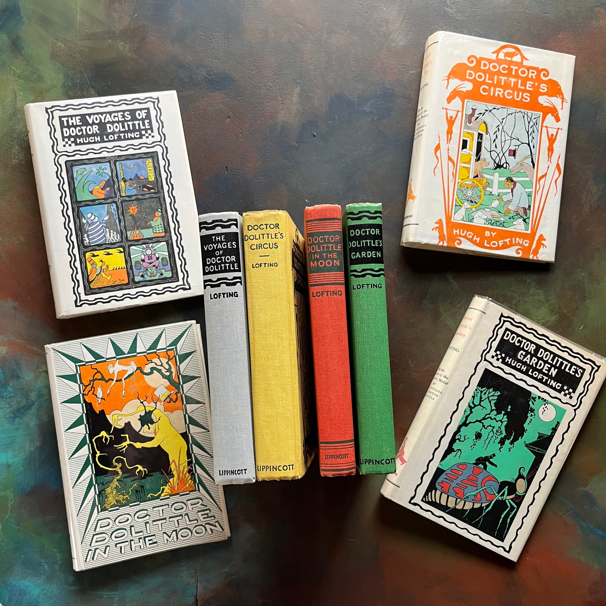 Hugh Lofting-Doctor Dolittle's Circus, Doctor Dolittle's Garden, Doctor Dolittle in the Moon and The Voyage of Doctor Dolittle-children's chapter books-view of the colorful spines