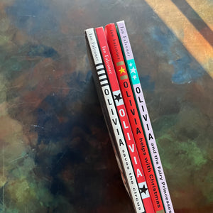 Ian Falconer Book Set-Olivia-Olivia Saves the Circus-Olivia Helps with Christmas-Olivia and the Fairy Princess-Caldecott Honor Book-view of the spines