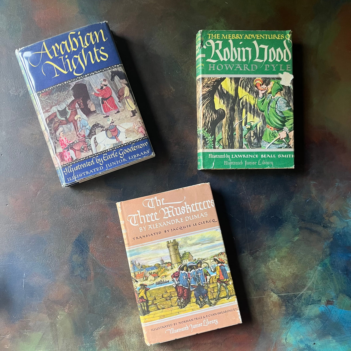 Illustrated Junior Library Editions Book Set-Three Musketeers-The Merry Adventures of Robin Hood-Arabian Nights-classic children's literature-view of the dust jacket's front covers