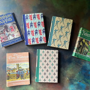 Illustrated Junior Library Editions Book Set-Three Musketeers-The Merry Adventures of Robin Hood-Arabian Nights-classic children's literature-view of the front covers