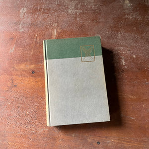 vintage children's chapter book, vintage short stories, vintage dog books - Jack London's Stories The Call of the Wild, The Cruise of the Dazzler & Other Stories of Adventure - view of the embossed front cover with a pair of snow shoes