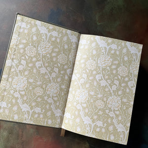 Jane Austen Seven Novels -Barnes and Noble Collectible Editions-Leatherbound Gift Book-Classic English Literature-view of the inside cover in a floral design in white & gold
