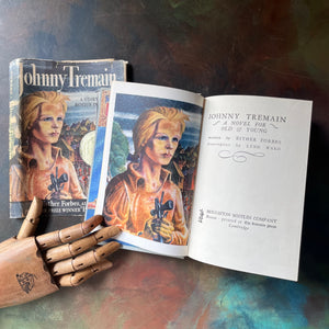 Johnny Tremain The Story of Boston in Revolt-Esther Forbes-1944 Newbery Award Winner-Lynd Ward-vintage living history book-view of the front cover & frontispiece image of Johhny Tremain - same image as the dust jacket's cover