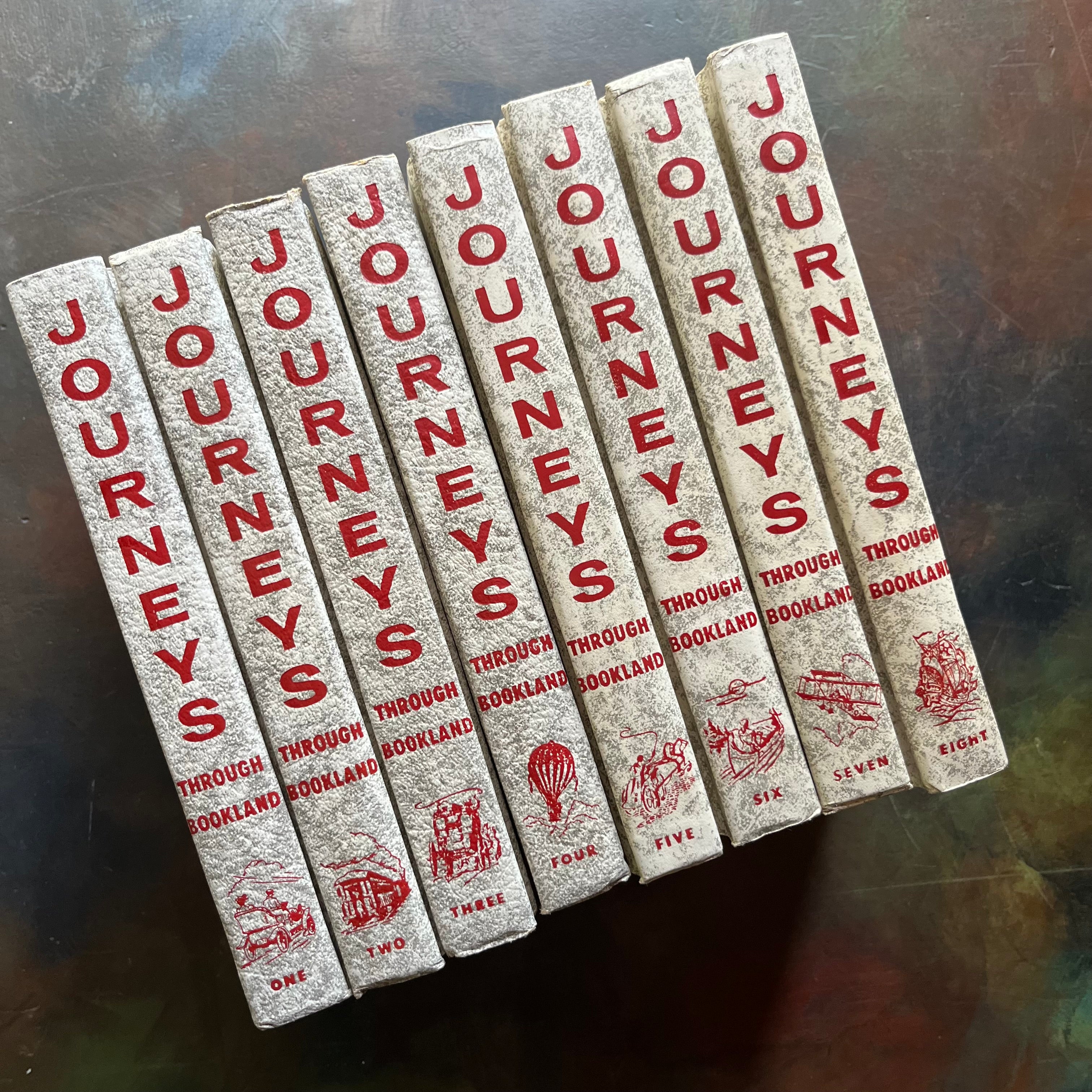 Journeys Through Bookland-Vintage 8-Volume Set-1955 Edition-classic literature anthology-view of the spines in white marbled design with red writing
