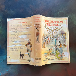 Junior Deluxe Editions Christmas Book Set-Stories from Dickens and Christmas Stories-Charles Dickens-vintage children's chapter books-short stories of Christmas-view of the outside of the dust jacket - note the wear & tears around the edges