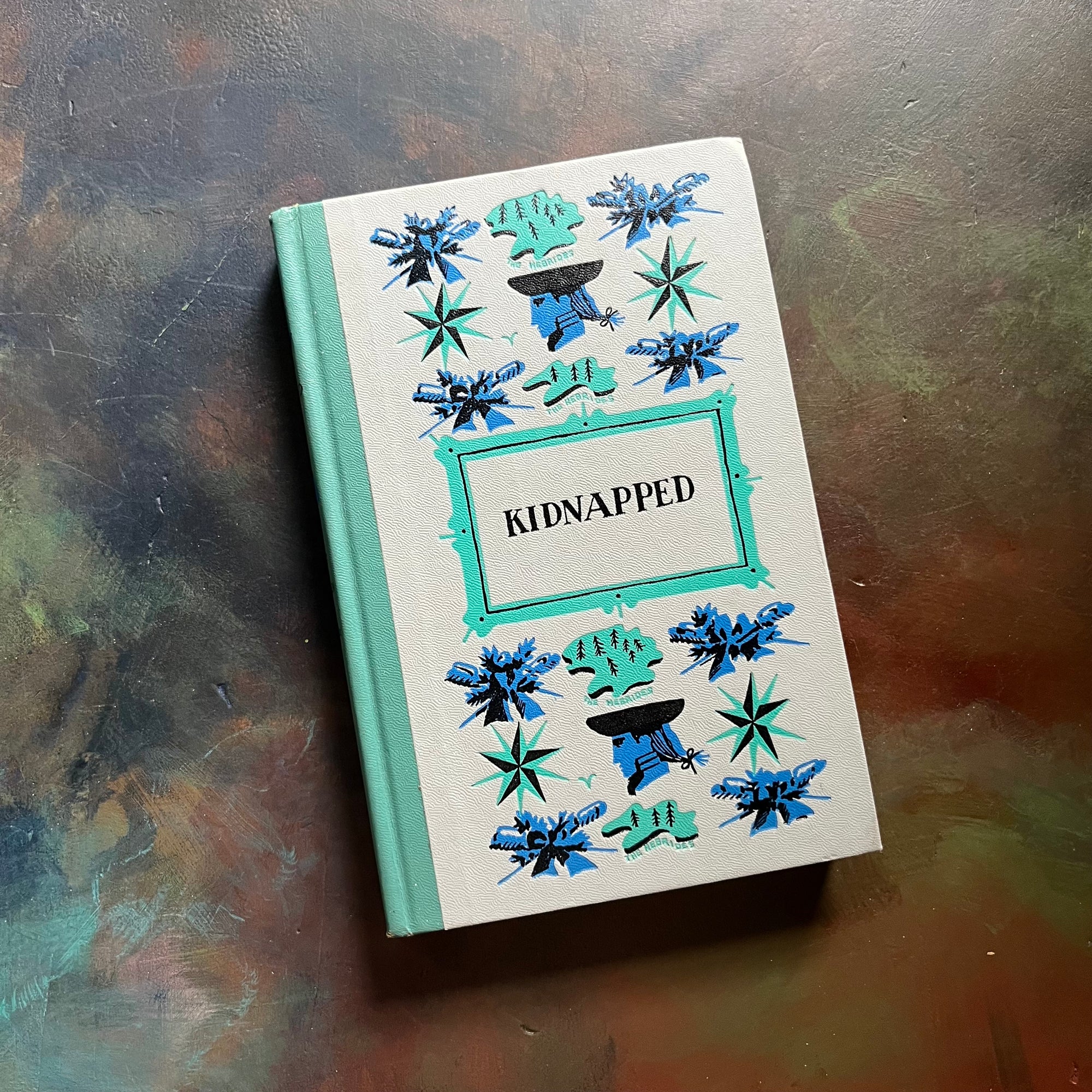 Kidnapped written by Robert Louis Stevenson with illustrations by Tom O'Sullivan-junior deluxe editions book-vintage children's book-view of the embossed front cover