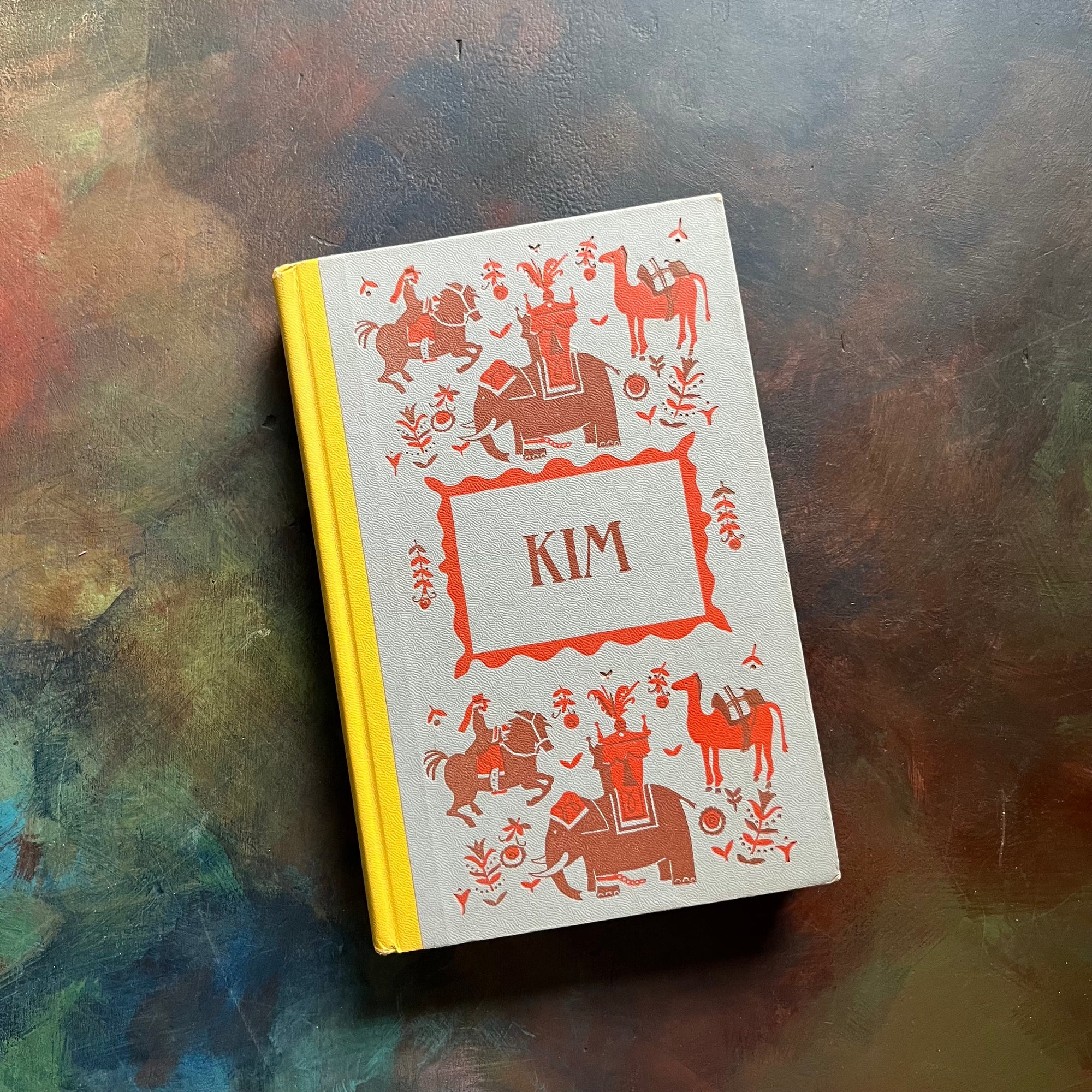 Kim written by Rudyard Kipling with illustrations by Richard M. Powers-1958 Junior Deluxe Editions Book-vintage children's chapter book-view of the front cover - embossed