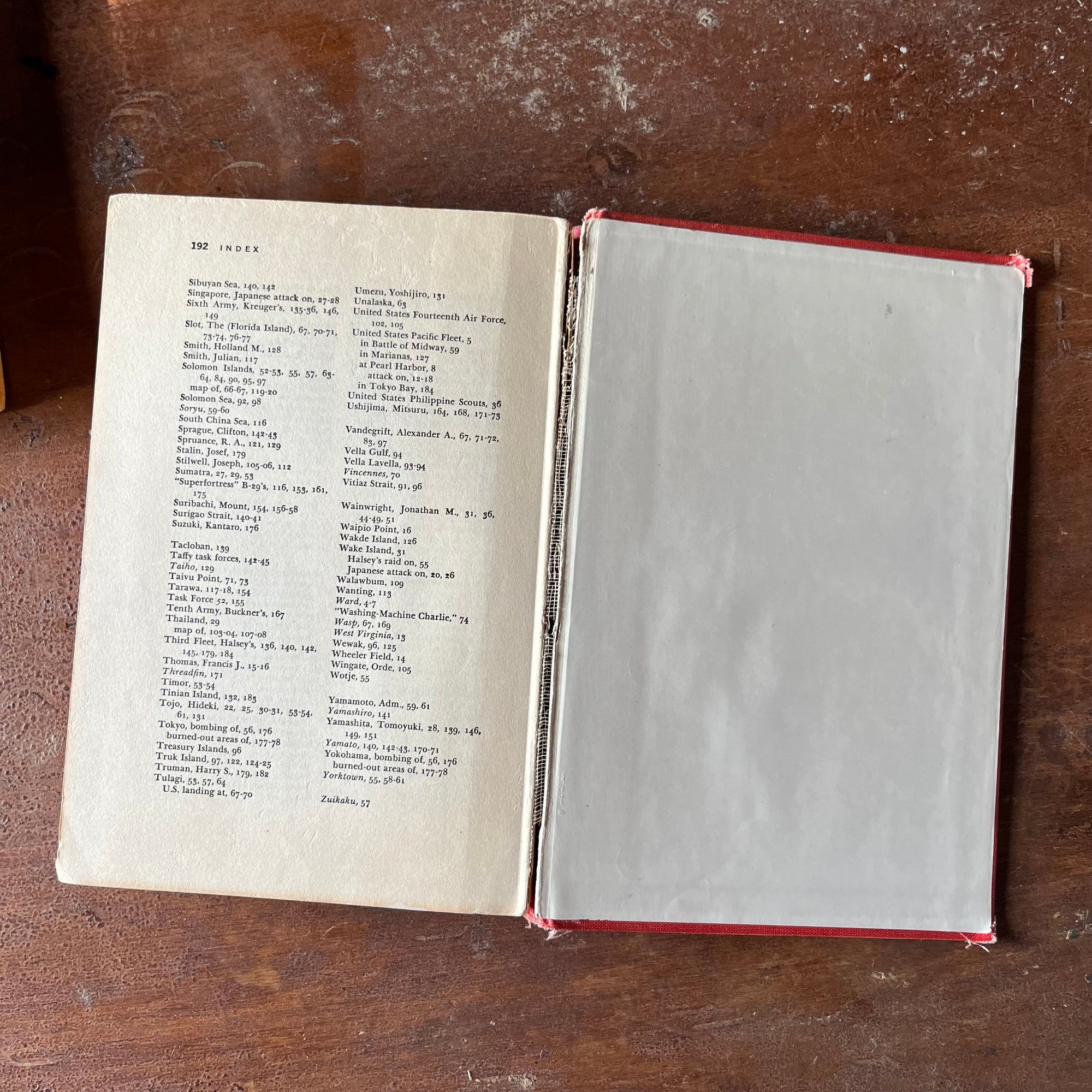 vintage children's history, chapter books - Pair of Landmark Series Books: The Story of the U. S. Coast Guard & From Pearl Harbor to Okinawa - view of the crack at the spine of From Pearl Harbor to Okinawa