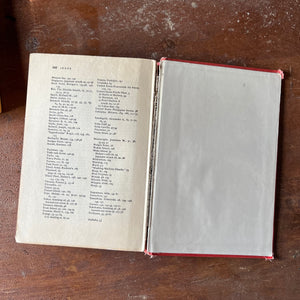 vintage children's history, chapter books - Pair of Landmark Series Books: The Story of the U. S. Coast Guard & From Pearl Harbor to Okinawa - view of the crack at the spine of From Pearl Harbor to Okinawa