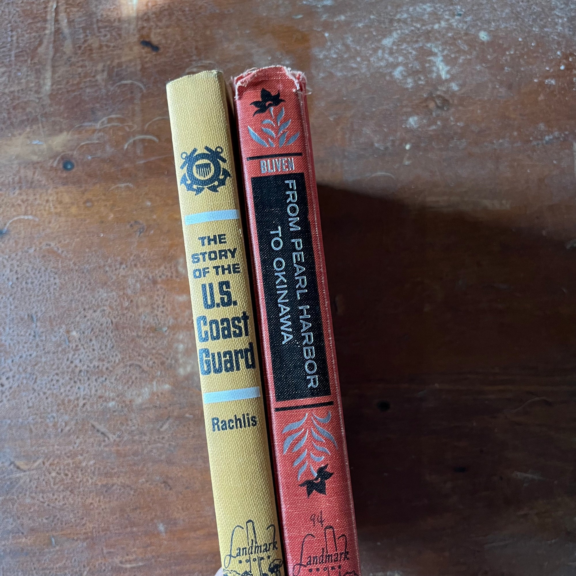 vintage children's history, chapter books - Pair of Landmark Series Books: The Story of the U. S. Coast Guard & From Pearl Harbor to Okinawa - view of the spines
