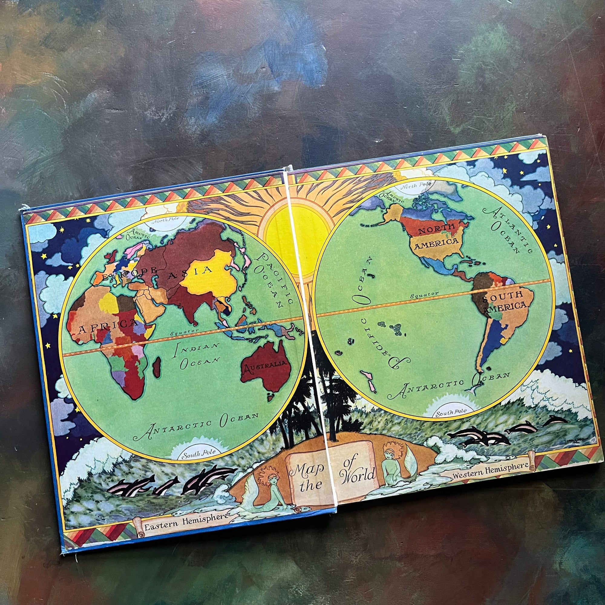 Little Folks of Other Lands written by Watty Piper-with illustrations by Lucille and Holling C. Holling-vintage world geography study-vintage children's book-view of the front, inside cover