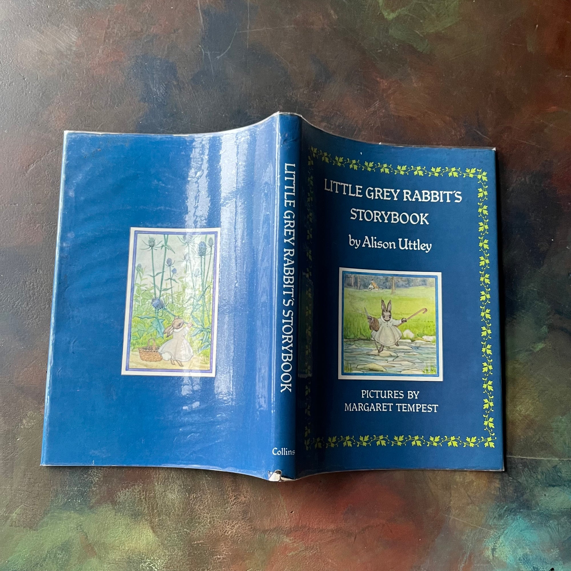 Little Grey Rabbit's Storybook written by Alison Uttley with illustrations by Margaret Tempest-vintage children's animal storybook-view of the outside of the dust jacket - note the dust jacket has been laminated