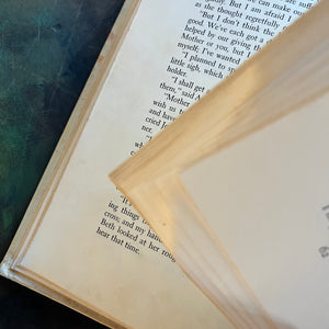 Little Women written by Louisa May Alcott with illustrations by Tasha Tudor-1969 Edition-classic American Literature-homeschool must have-classic children's literature-view of the bent page edges a the beginning of the book