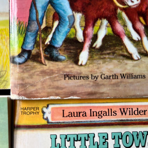 Little House on the Prairie Box Set in Blue written by Laura Ingalls Wilder with Illustrations by Garth Williams-vintage children's chapter books-view of the condition of the bottom of the cover of Farmer Boy