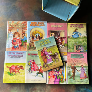 Little House on the Prairie Box Set in Blue written by Laura Ingalls Wilder with Illustrations by Garth Williams-vintage children's chapter books-view of the front covers