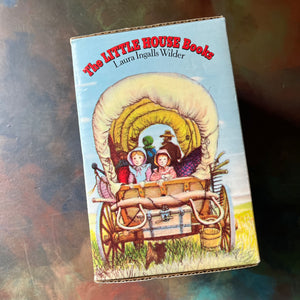 Little House on the Prairie Box Set in Blue written by Laura Ingalls Wilder with Illustrations by Garth Williams-vintage children's chapter books-view of the side of the box sleeve