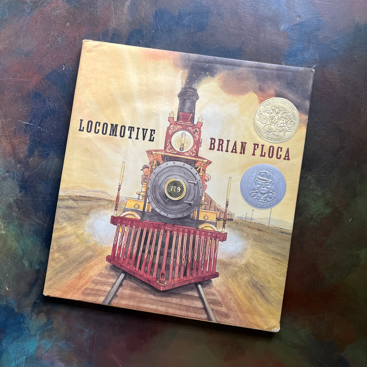 Locomotive Written by Brian Floca-2014 Caldecott Medal Winner-children's picture book-living history book-view of the dust jacket's front cover