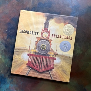 Locomotive Written by Brian Floca-2014 Caldecott Medal Winner-children's picture book-living history book-view of the dust jacket's front cover