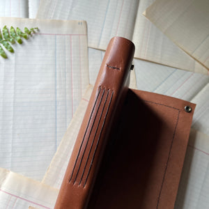 Log Cabin Leather Journal or Guest Book, nature, gratitude or book journal - blank journal - view of the long stitched binding on the spine