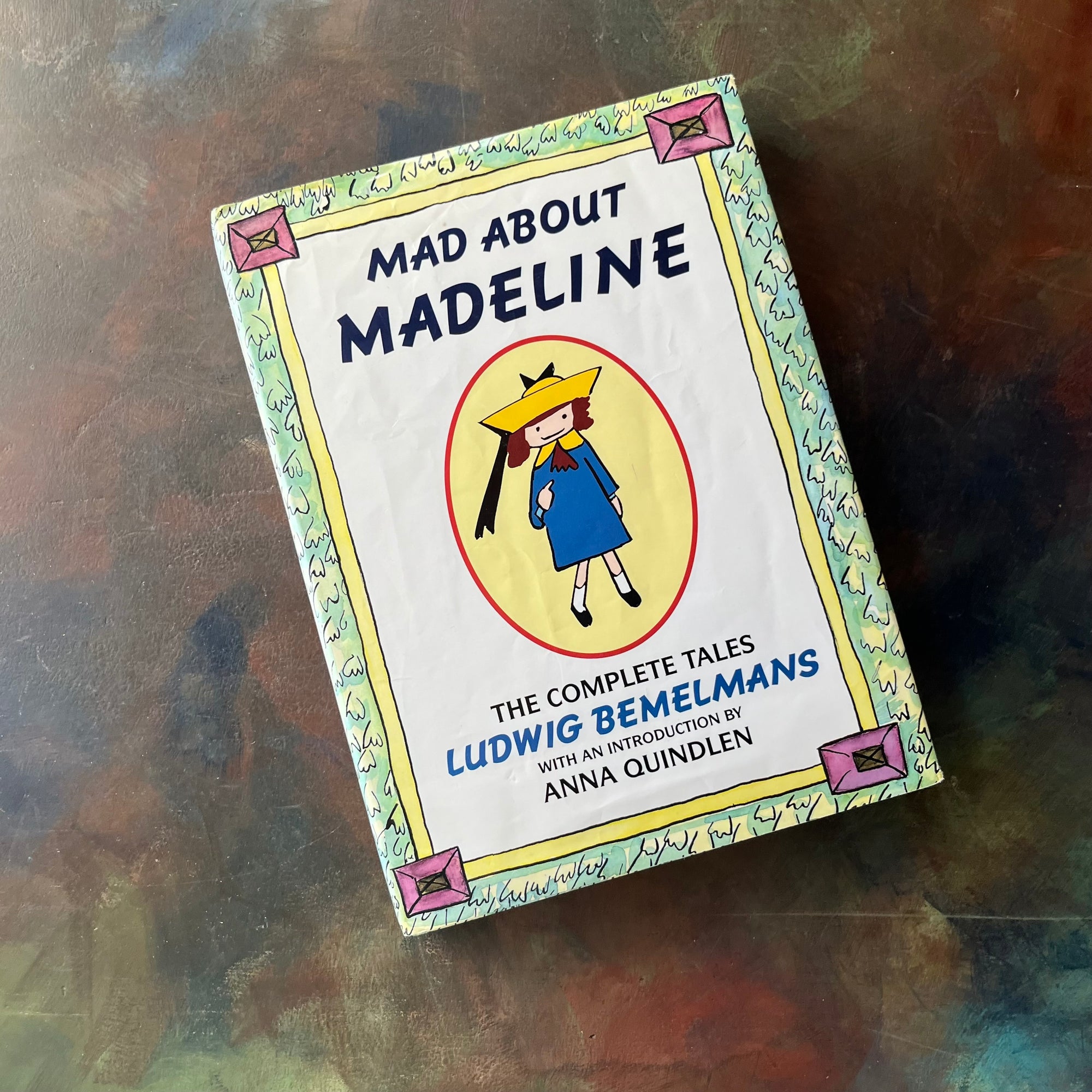 Mad About Madeline written & illustrated by Ludwig Bemelmans-The Complete Tales-with introduction by Anna Quindlen-vintage children's picture books-vintage living books-view of the dust jacket's front cover - note the wrinkles in the cover