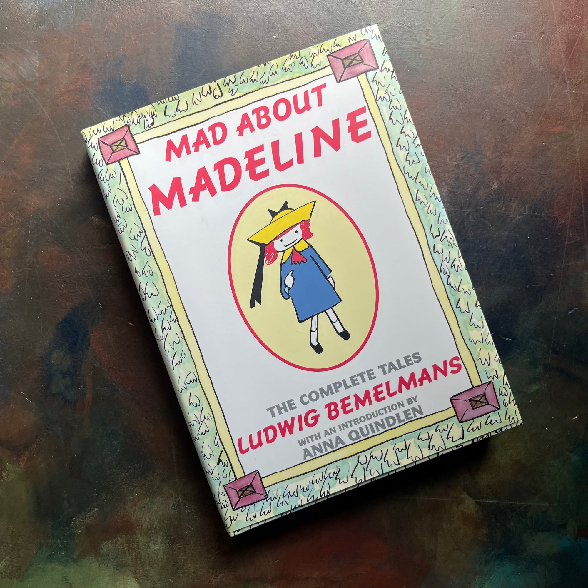 Mad About Madeline written & illustrated by Ludwig Bemelmans-The Complete Tales-with introduction by Anna Quindlen-vintage children's picture books-vintage living books-award winning author and book-view of the dust jacket's front cover with an illustration of Madeline