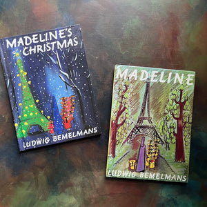 Madeline- and Madeline's Christmas written and illustrated by Ludwig Bemelmans-Caldecott Honor winner-vintage children's picture books-view of the colorful front covers with the iconic image of a nun walking with little girls in two rows