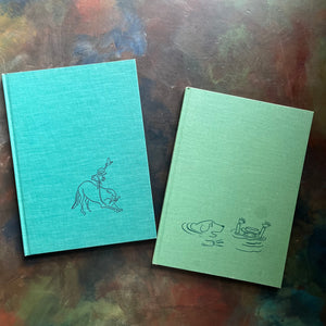 Madeline's Rescue (1954 Caldecott Winner)-Madeline and the Gypsies-written and illustrated by Ludwig Bemelmans-Caldecott winner-vintage children's picture books-view of the clothbound front covers with images depicting a scene from each book