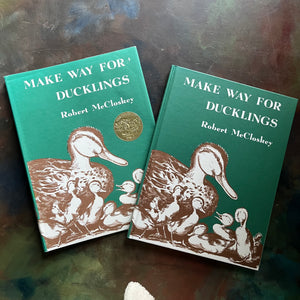 Make Way for Ducklings-Robert McCloskey-Caldecott Winning Picture Book-vintage children's picture book-must read children's book-Log Cabin Vintage Top 100 Must Read Children's Book-view of the front cover showing the same image as the dust jacket cover described in the last image