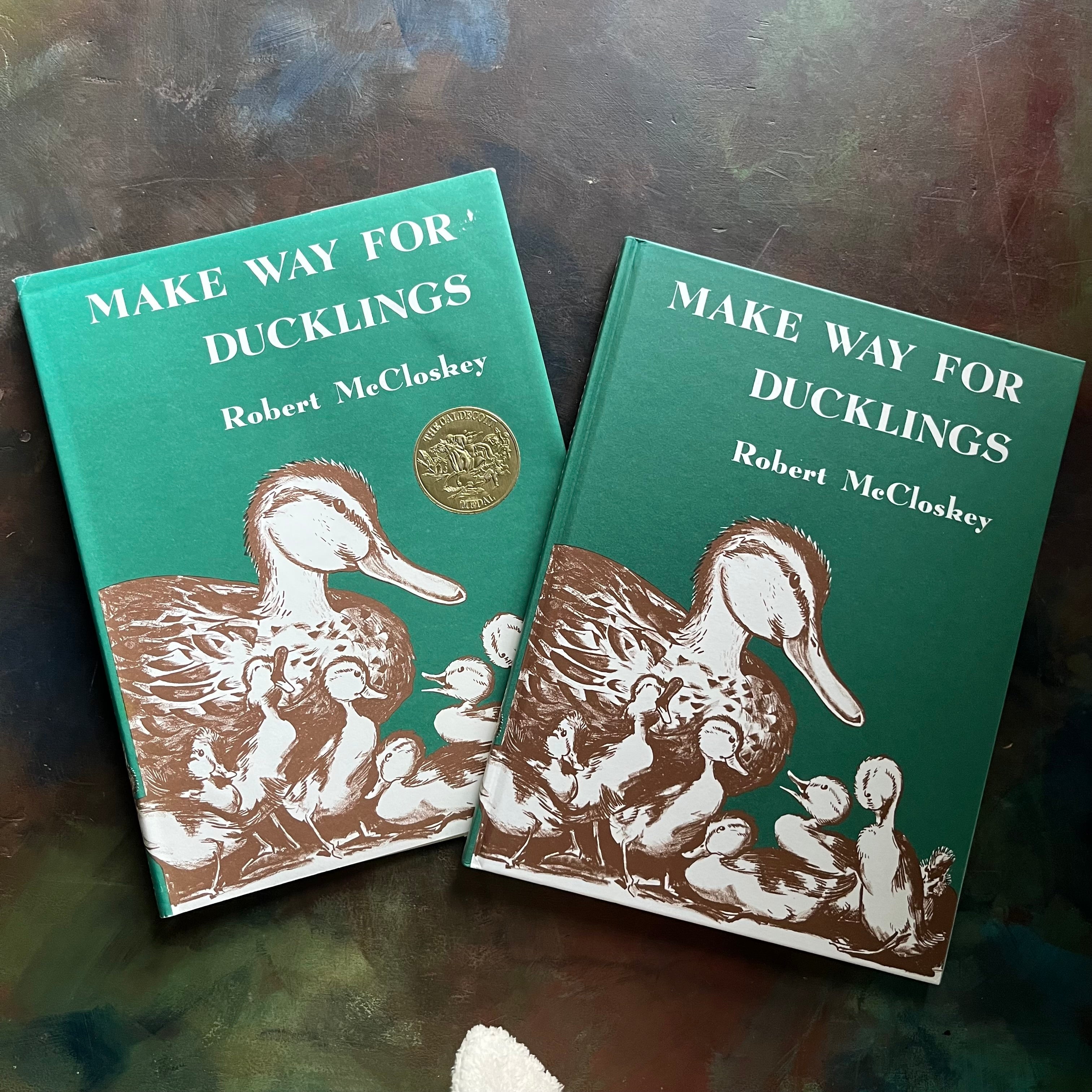 Make Way for Ducklings-Robert McCloskey-Caldecott Winning Picture Book-vintage children's picture book-must read children's book-Log Cabin Vintage Top 100 Must Read Children's Book-view of the front cover showing the same image as the dust jacket cover described in the last image
