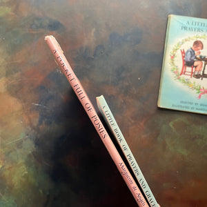 Marguerite de Angeli's A Pocket Full of Posies-A Little Book of Prayers and Graces by Quail Hawkins-first prayer book-view of the spines