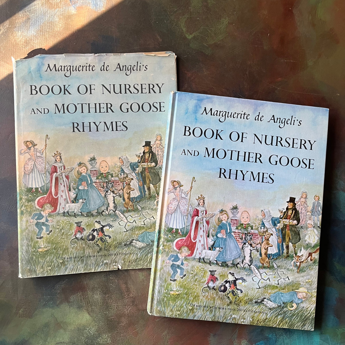 Marguerite de Angeli's Book of Nursery and Mother Goose Rhymes-vintage children's book-Caldecott honor book-view of the front cover with dust jacket
