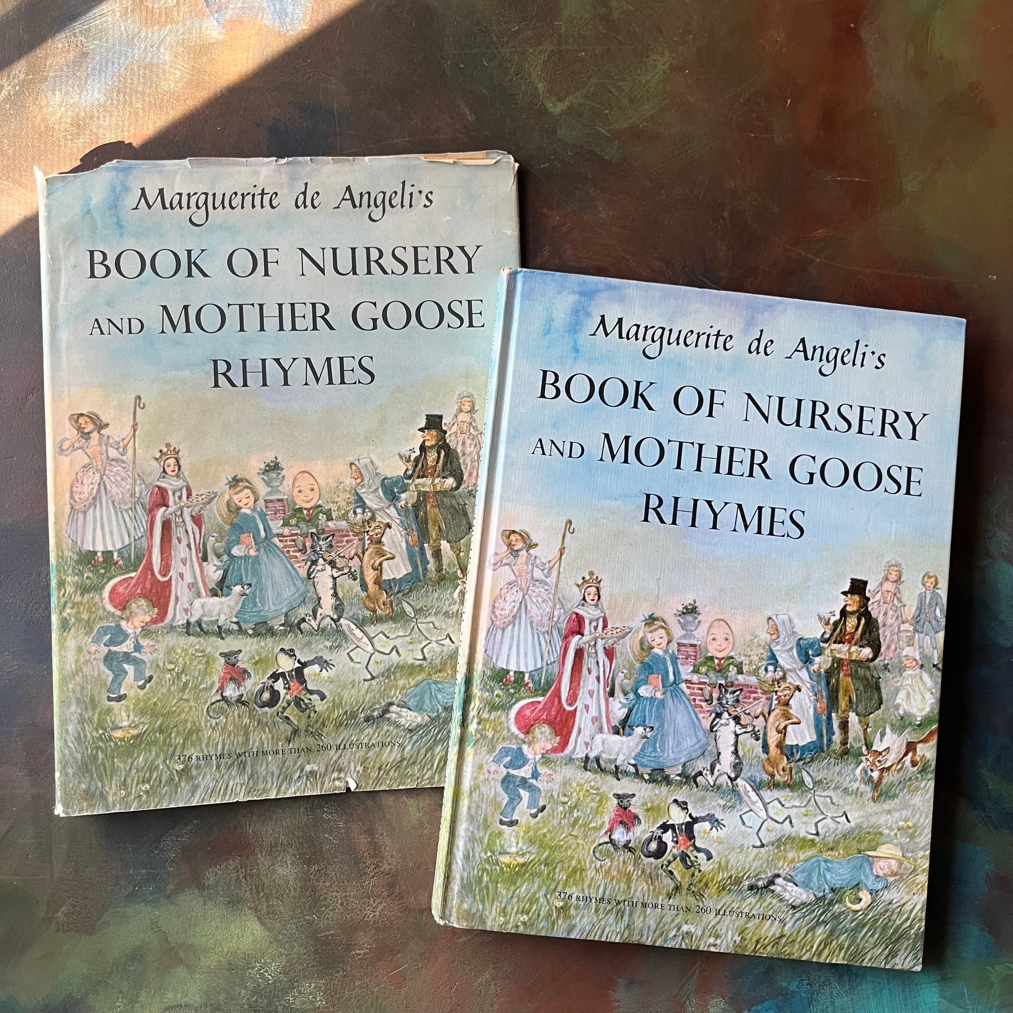 Marguerite de Angeli's Book of Nursery and Mother Goose Rhymes-vintage children's book-Caldecott honor book-view of the front cover with dust jacket
