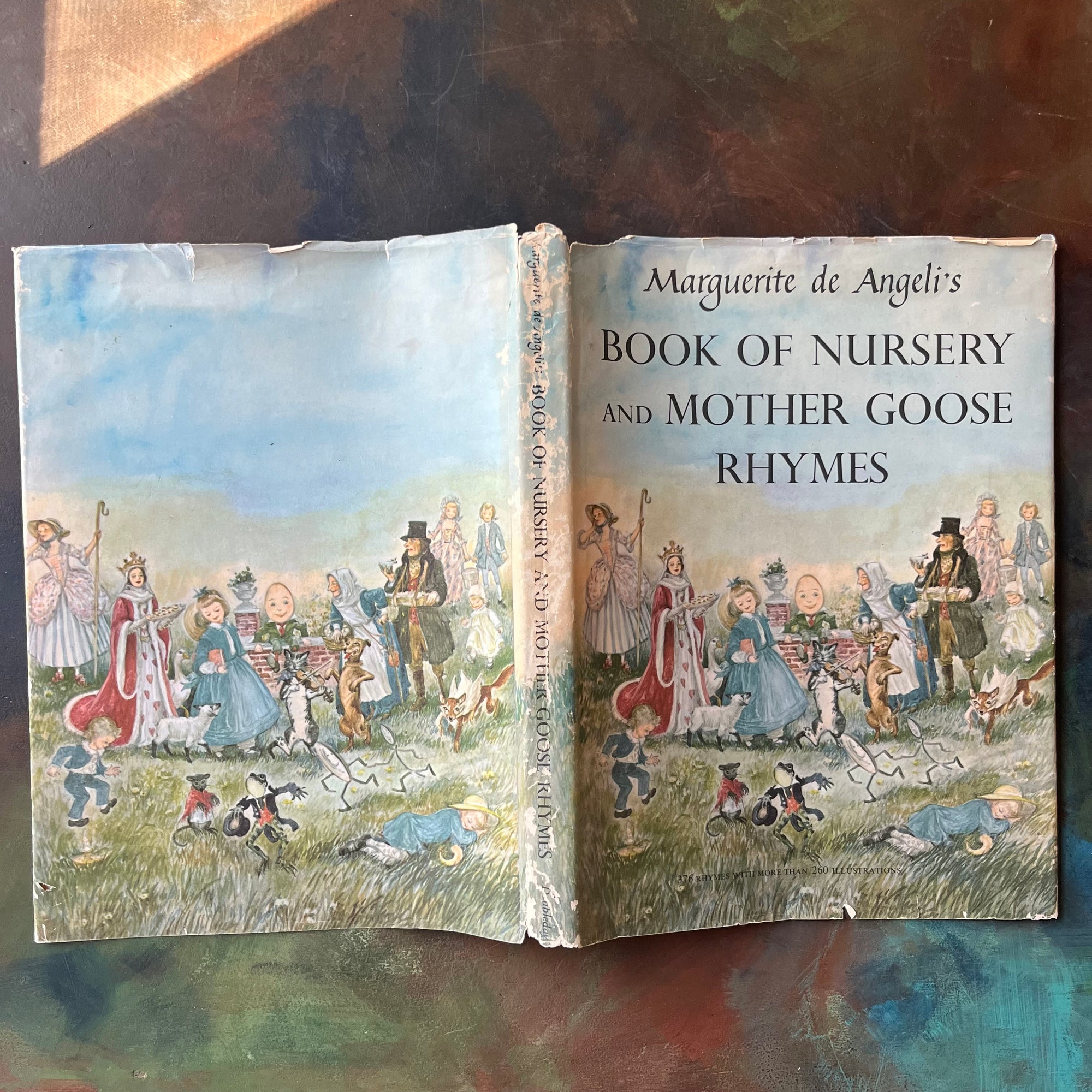 Marguerite de Angeli's Book of Nursery and Mother Goose Rhymes-vintage children's book-Caldecott honor book-view of the outside of the dust jacket