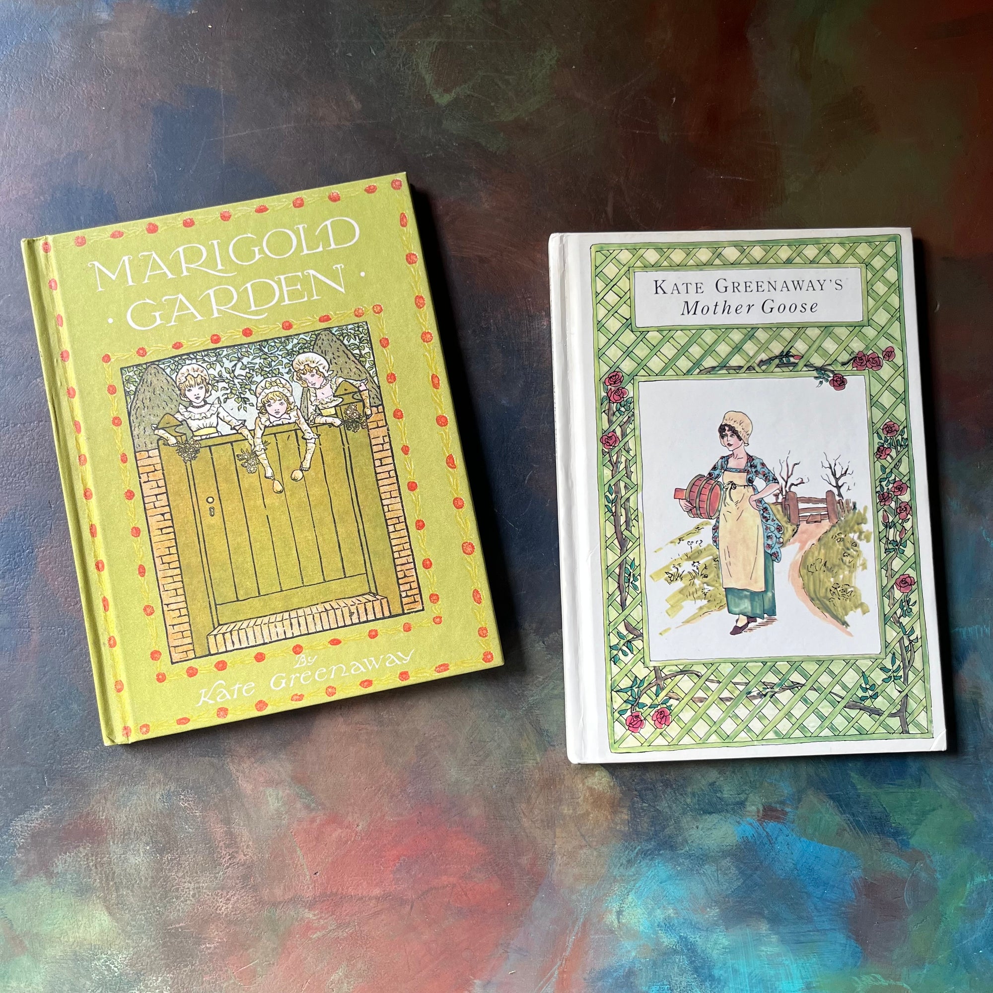 Marigold Garden & Kate Greenaway's Mother Goose-vintage poetry-vintage nursery rhymes-Kate Greenaway-view of the front covers- Marigold Garden is clothbound while Mother Goose is glossy
