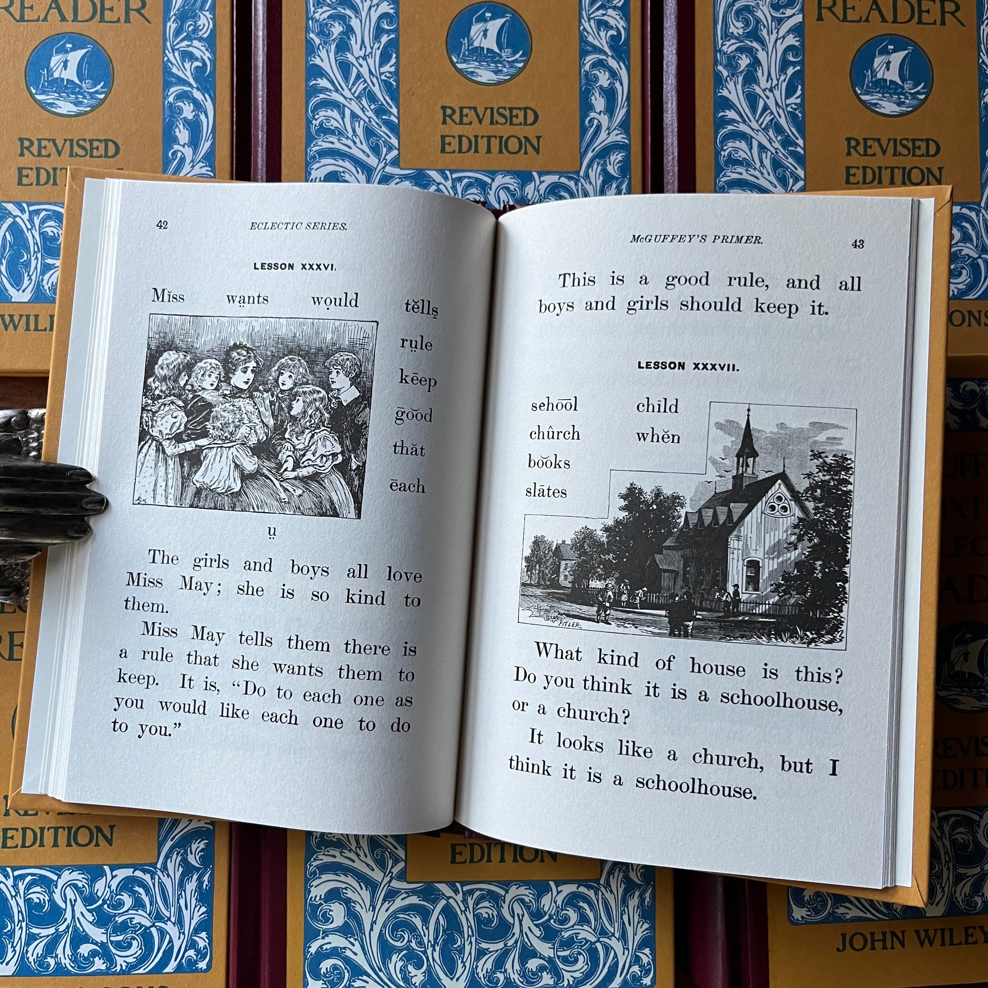 vintage children's books, children's school primers - McGuffey's Eclectic Readers Primer Through the Sixth written by William Holmes McGuffey - Complete Book Set in Cardboard Sleeve - view of a sample page from the books - this one has illustrations as well as larger text for young readers