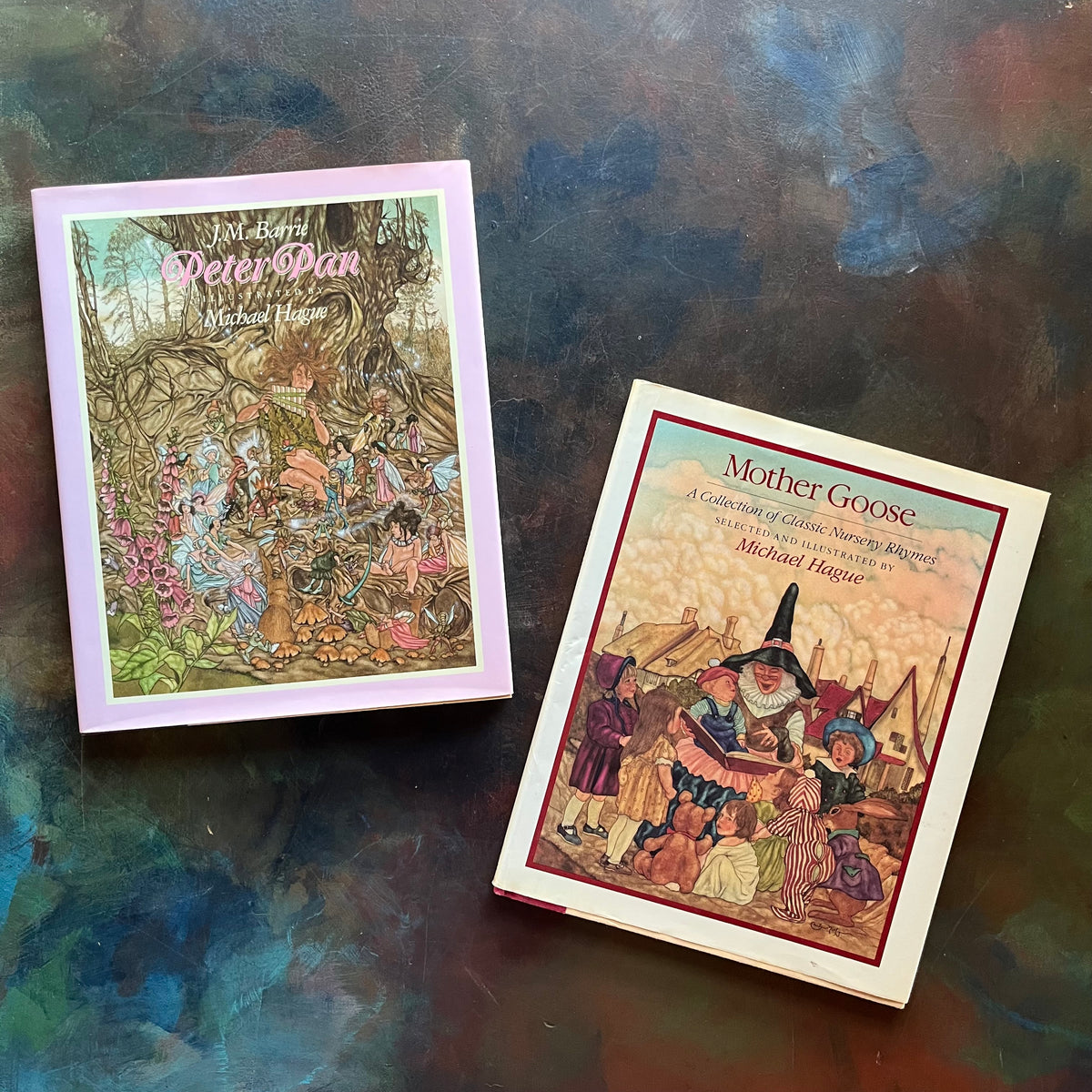 Michael Hague Illustrated Books Set-Peter Pan written by J. M. Barrie-Mother Goose-Vintage Children’s Classics-read aloud favorites-view of the dust jacket's front covers with detailed illustrations by Michael Hague